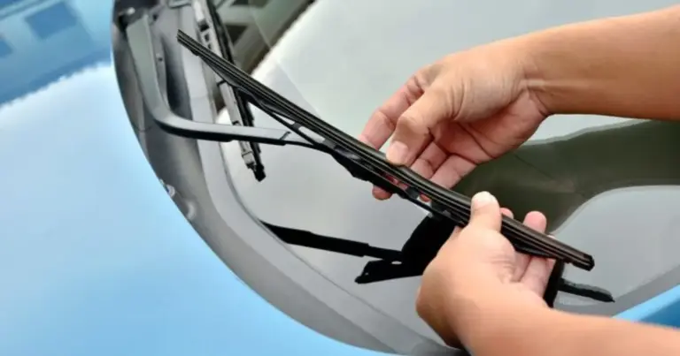 How to adjust the tension of a windshield wiper arm